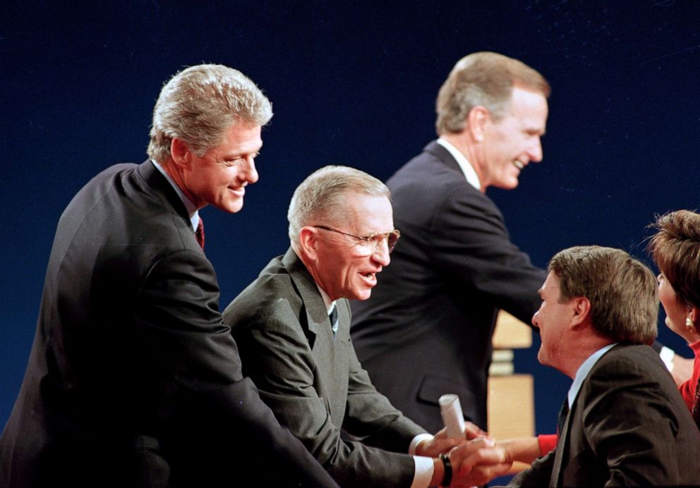 PHOTO: Democratic presidential candidate Gov. Bill Clinton, left, Independent Ross Perot and President George Bush shake hands with the panelists following their third presidential debate at Michigan State University in East Lansing, Mich., Oct. 19, 1992.