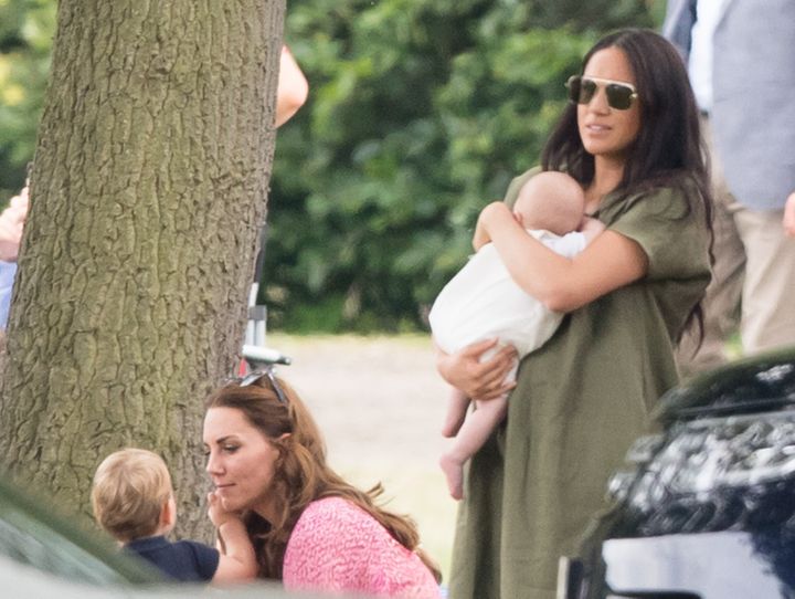 Kate and Meghan tending to their children.&nbsp;