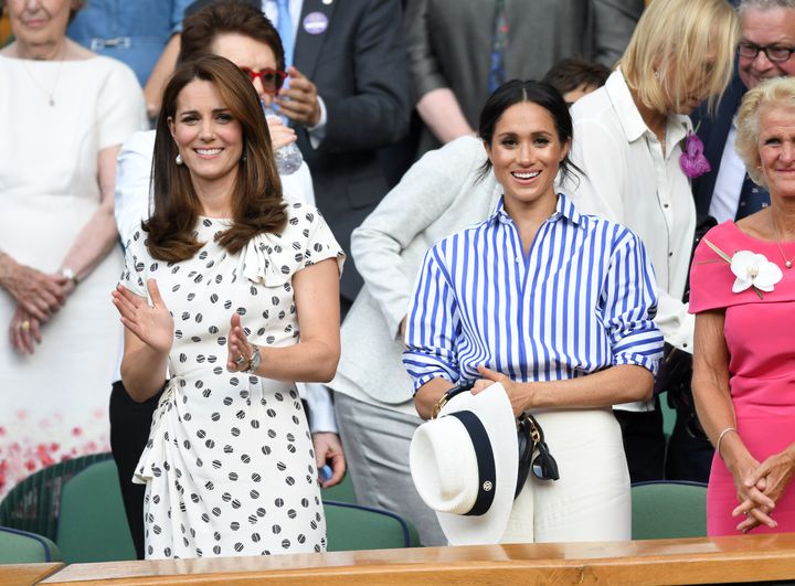 Kate and Meghan at the Wimbledon Tennis Championships at the All England Lawn Tennis and Croquet Club on July 14, 2018.