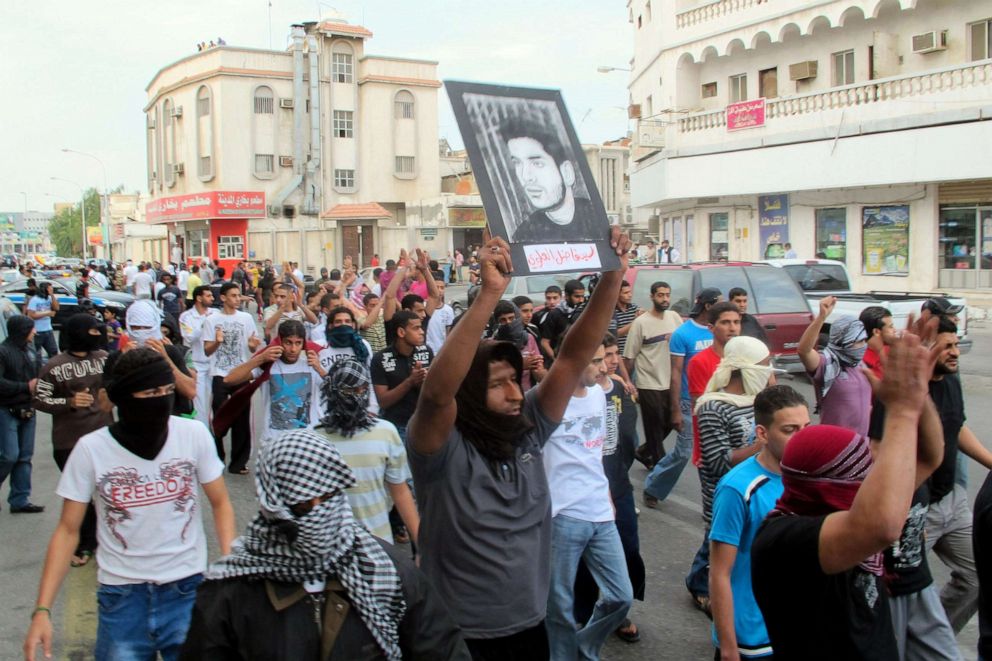 PHOTO: In this file photo, a protester holds a picture of a man said to be held prisoner without trial, during a demonstration in Saudi Arabias eastern Gulf coast town of Qatif, March 11, 2011.