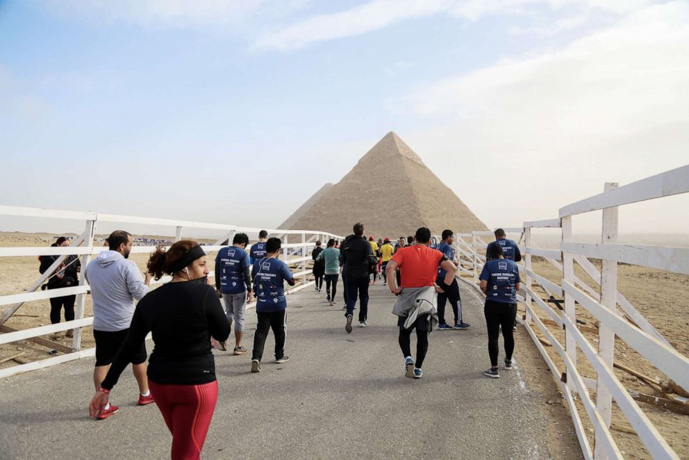 PHOTO: People gather around the Great Pyramid of Giza, which is located in the western part of capital city Cairo, in Egypt, Feb. 15, 2019. 