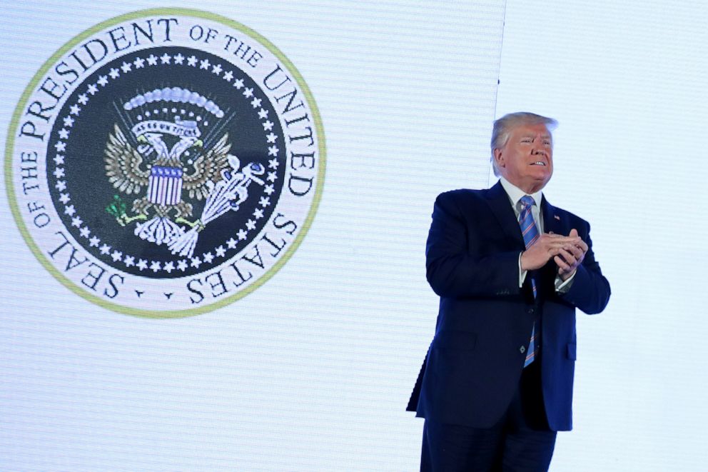PHOTO: U.S. President Donald Trump takes the stage next to an altered presidential seal prior to a speech at Turning Point USAs Teen Student Action Summit in Washington, July 23, 2019.