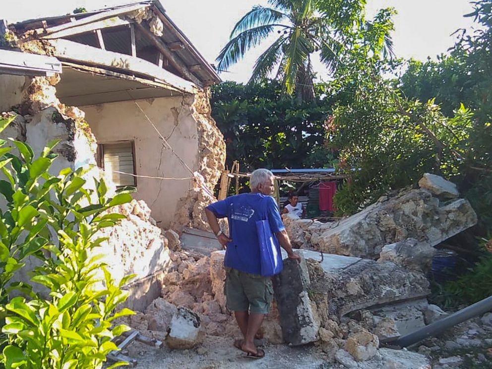 PHOTO: A resident looks at damaged houses after two earthquakes struck in Itbayat town, Batanes islands, northern Philippines, July 27, 2019.