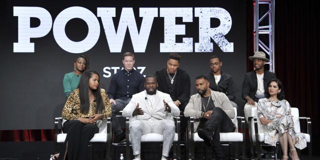 Naturi Naughton, from back row left, Joseph Sikora, Rotimi, Michael Rainey, Jr., Larenz Tate, and from front row left, creator/executive producer Courtney A. Kemp, Curtis "50 Cent" Jackson, Omari Hardwick and Lela Loren participate in the Starz "Power" panel at the Television Critics Association Summer Press Tour