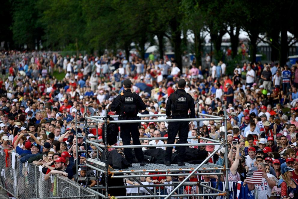 PHOTO: UUS Secret Service stand on guard as people gather on the National Mall ahead of the Salute to America Fourth of July event with US President Donald Trump at the Lincoln Memorial in Washington, DC, July 4, 2019.