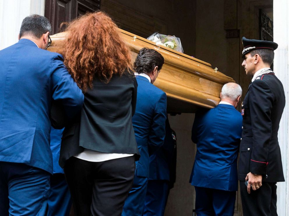 PHOTO: Carabinieri officer Mario Cerciello Regas wife, Rosa Maria, follows the coffin of her husband as it arrives to be laid in state, in Rome, July 28, 2019. 