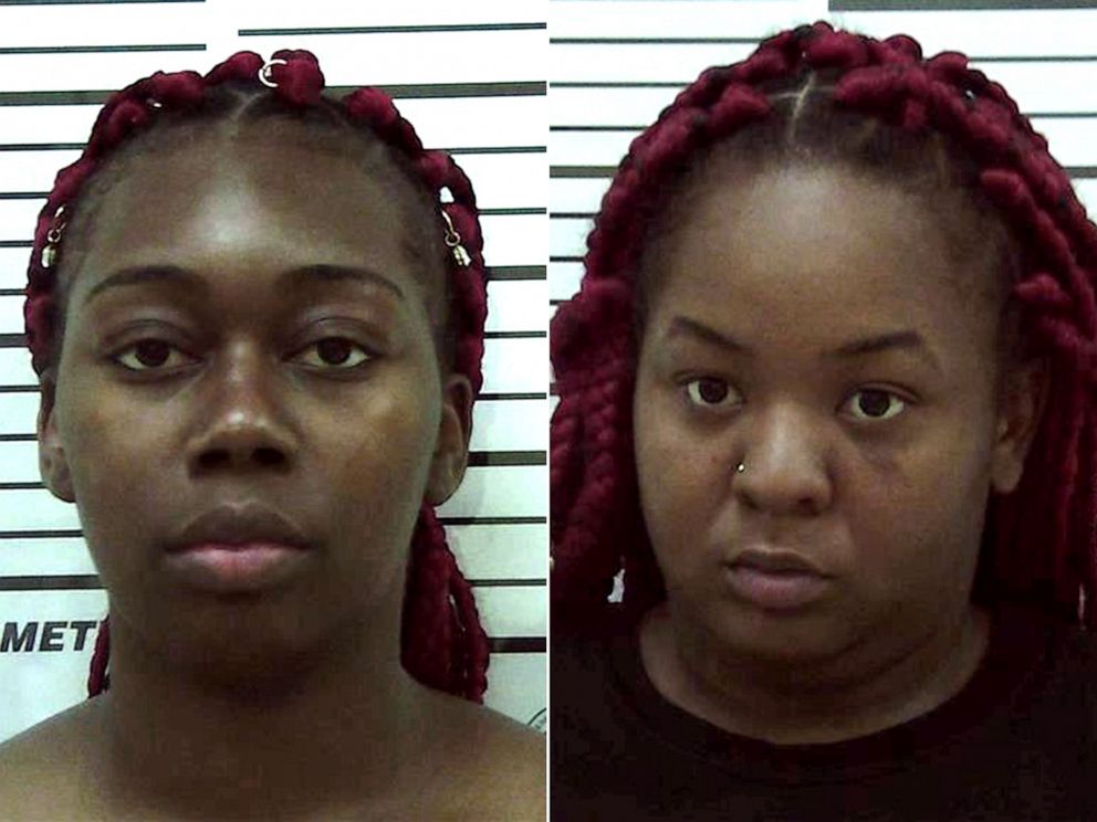 PHOTO: Karen Lashun Harrison and Carneata Clark in police booking photos. 