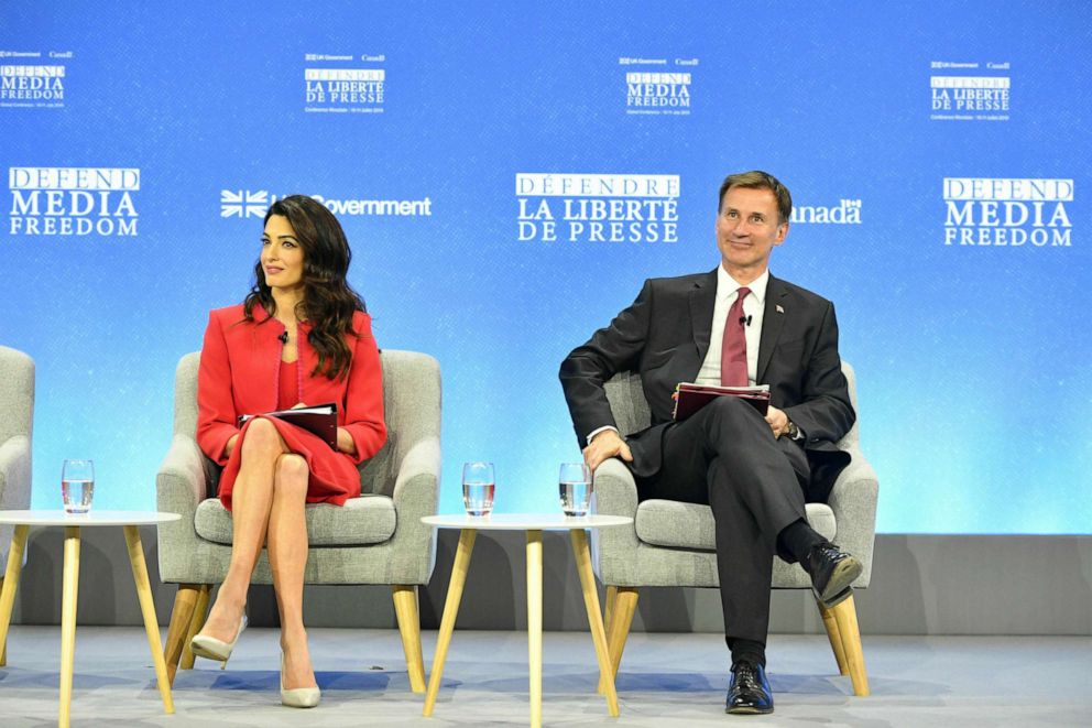 PHOTO: Amal Clooney and Britains Foreign Secretary Jeremy Hunt during the Global Conference for Media Freedom in London, July 10, 2019.