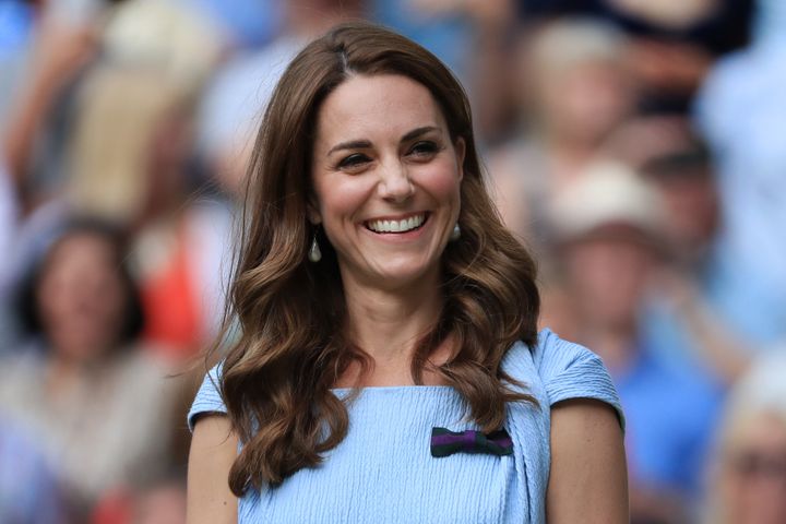The Duchess of Cambridge laughs and smiles on Day 13 of The Championships - Wimbledon 2019 at the All England Lawn Tennis and