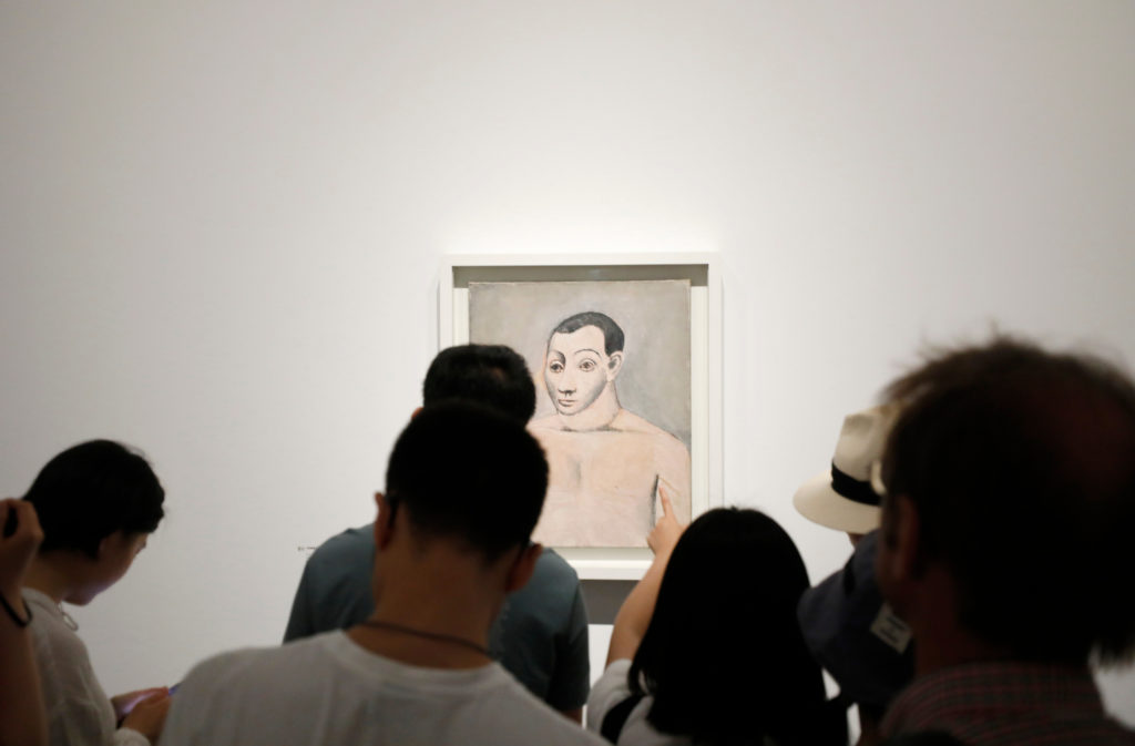 Visitors to the UCCA Contemporary Art Center's "Picasso – Birth of a Genius" exhibition.