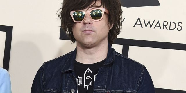 In this Feb. 8, 2015 file photo, Ryan Adams arrives at the 57th annual Grammy Awards in Los Angeles. A New York Times report says seven women have claimed singer-songwriter Ryan Adams offered to help them with their music careers but then turned things sexual, and he sometimes became emotional and verbally abusive. In the story published Wednesday, Feb. 13, 2019, a 20-year-old female musician said Adams, 44, had inappropriate conversations with her while she was 15 and 16.