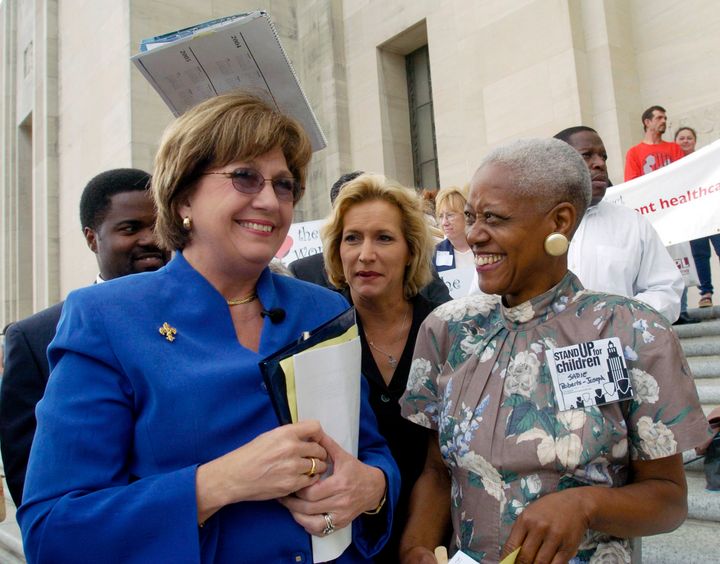 Sadie Roberts-Joseph (right), talks with Gov. Kathleen Blanco (left) before the start of the Stand Up for Children 2004 Rally