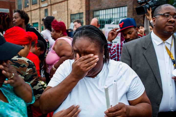 Shafonia Logan cries during a vigil for her husband, Eric Logan, who was shot and killed by a South Bend officer in an apartm