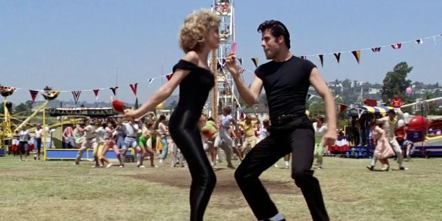 John Travolta and Olivia Newton-John filming "Grease."