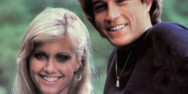 Andy Gibb with Olivia Newton-John. (Photo by GAB Archive/Redferns)