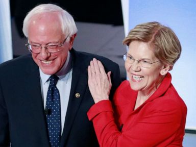 PHOTO: Senator Bernie Sanders and Senator Elizabeth Warren shake hands before the start of the first night of the second 2020 Democratic presidential debate in Detroit, July 30, 2019. 