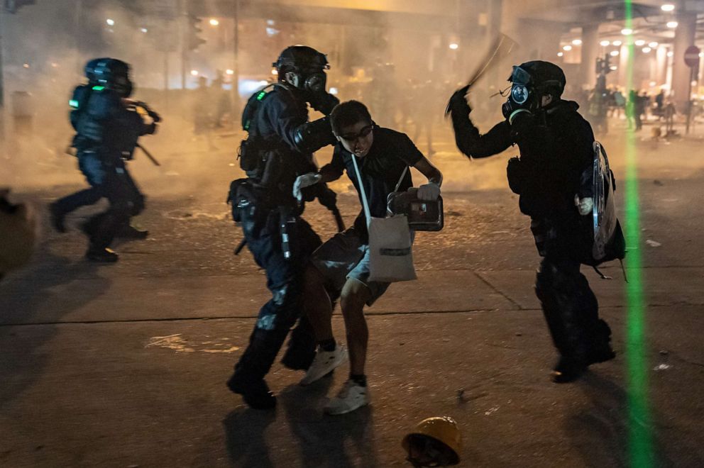 PHOTO: Riot police detain a protester during a demonstration, Aug. 5, 2019, in Hong Kong, China.