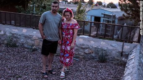 Armando Diaz, a small business owner, and his wife Alma Diaz pose Tuesday outside their home in Socorro, Texas.