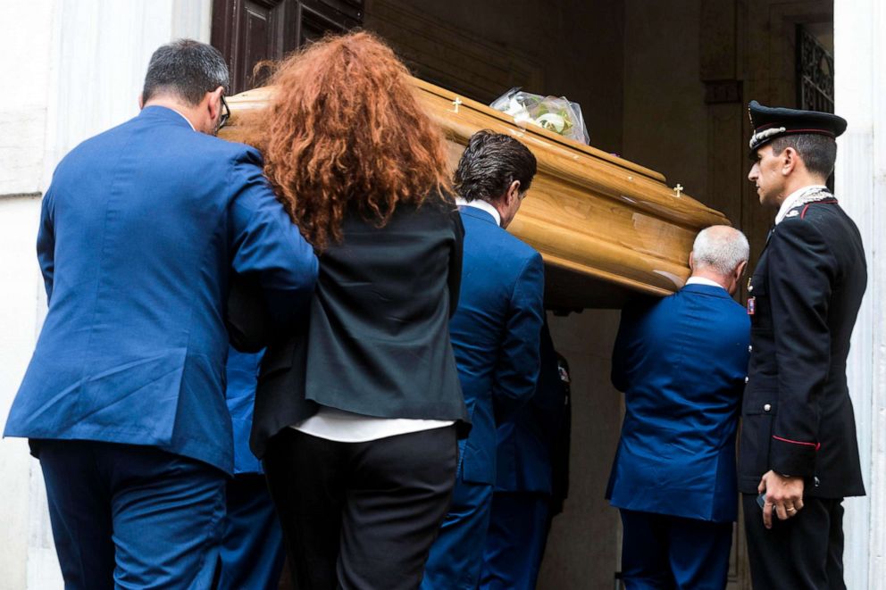 PHOTO: Carabinieri officer Mario Cerciello Regas wife, Rosa Maria, follows the coffin of her husband as it arrives to be laid in state, in Rome, July 28, 2019. 