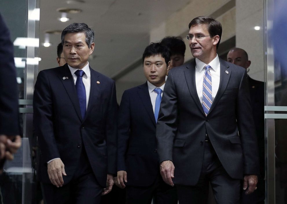 PHOTO: US Secretary of Defense Mark Esper and South Korean Defense Minister Jeong Kyeong-doo arrive for a signing ceremony ahead of a meeting at the Defense Ministry in Seoul, South Korea, August 9, 2019.