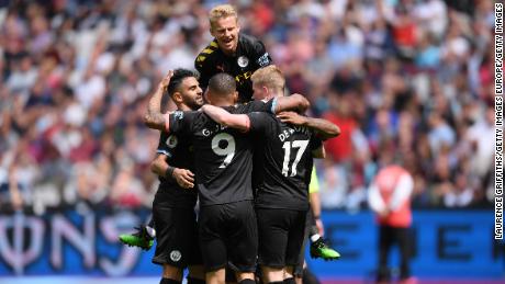 Man City players celebrate Sterling&#39;s second goals against West Ham.