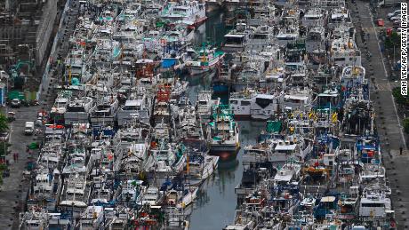 Fishing boats packed into the typhoon shelter in Nanfangao Harbour in Suao, Yilan county, Taiwan, as Typhoon Lekima approaches on August 8, 2019. 