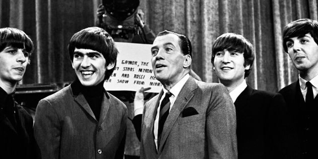 Ed Sullivan with The Beatles, before the group's second appearance on 'The Ed Sullivan Show' on Feb.y 16, 1964 at the Deauville Hotel in Miami Beach, Fla. (Photo by Jeff Hochberg/Getty Images)