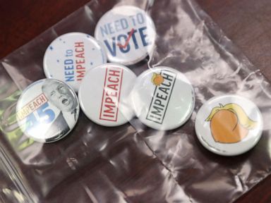 PHOTO:Buttons are set out for attendees at a Need to Impeach teach-in at a public library in Chantilly, Va., June 22, 2019.