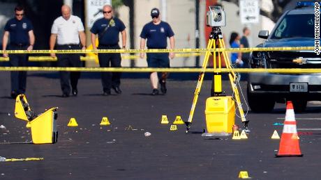 Evidence markers rest on the street at the scene of a mass shooting in Dayton, Ohio. 