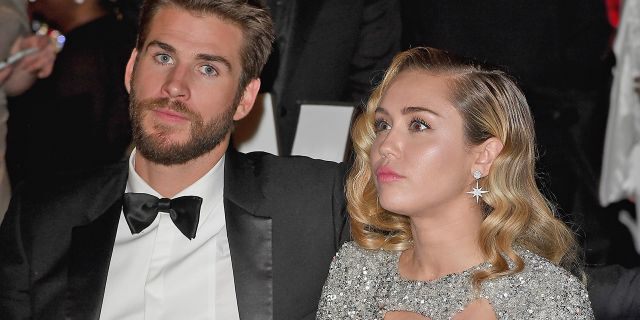 Liam Hemsworth, pictured here with Miley Cyrus in March 2018, filed for divorce on Wednesday. 