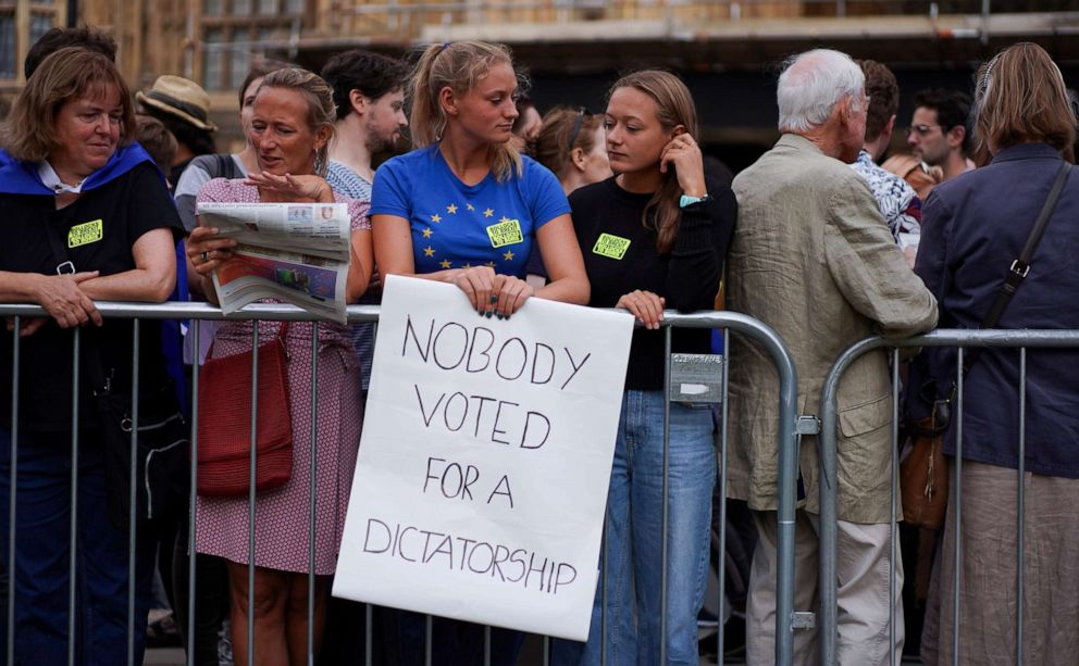 PHOTO: An anti-Brexit protester holds a placard outside the Houses of the Parliament in London, Aug. 28, 2019.
