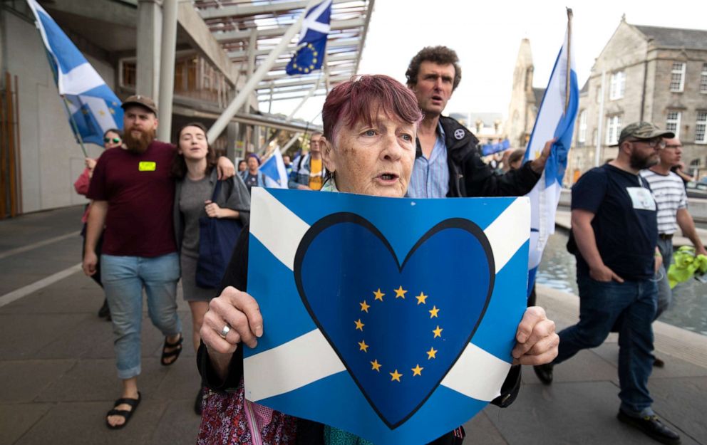 PHOTO: Protesters from the European Movement in Scotland hold a walking vigil outside the Scottish Parliament in Edinburgh to demonstrate against Prime Minister Boris Johnson proroguing Parliament, in Scotland, Aug. 28, 2019.