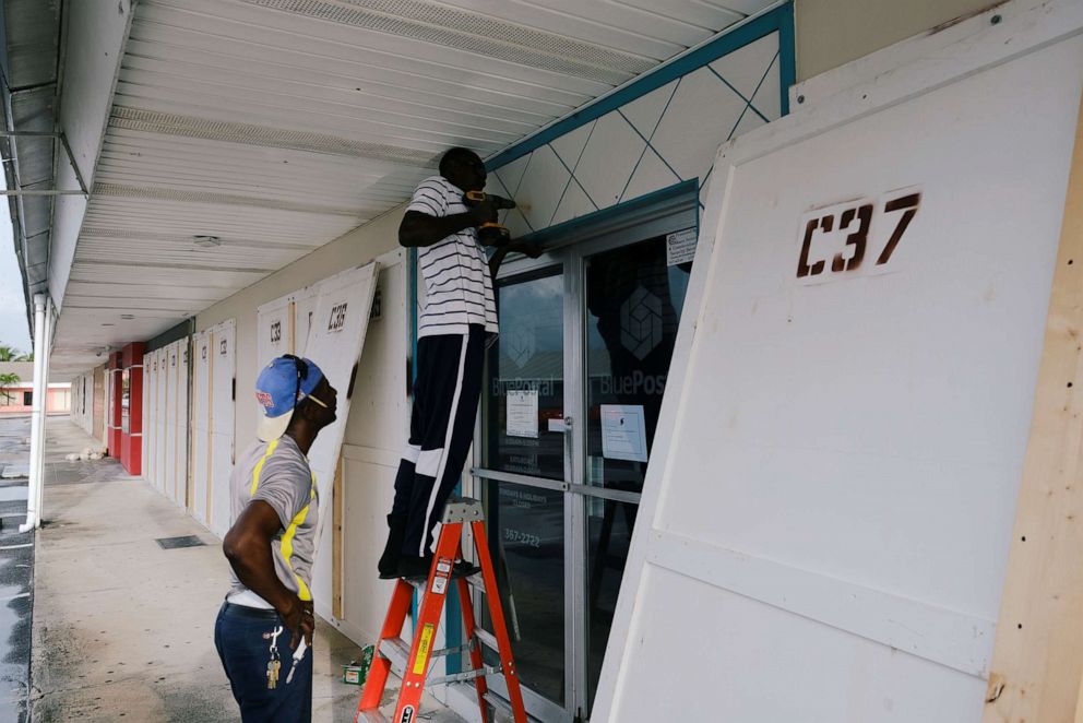 PHOTO: Workers install storm shutters before the arrival of Hurricane Dorian in Marsh Harbour, on the Great Abaco Island, Bahamas, August 31, 2019.