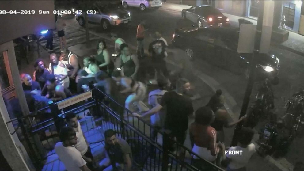 PHOTO: People react to a gunman in a still image from surveillance video released by police in Dayton, Ohio, Aug. 4, 2019.