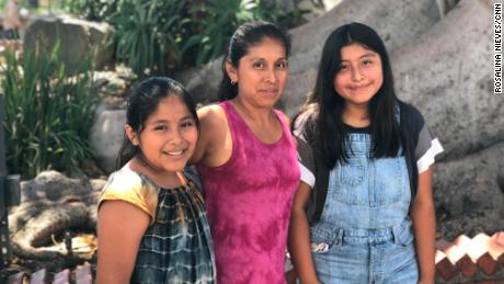 Fabiola Lucas with her two daughters.