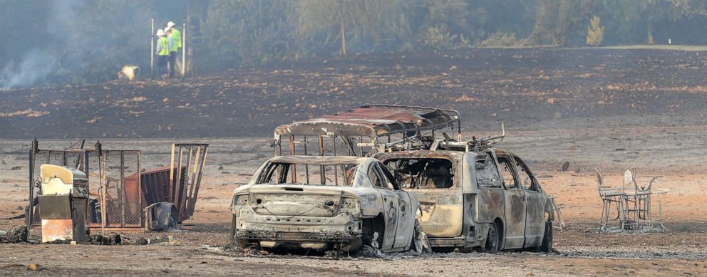 PHOTO: Police and fire officials keep tabs on hot spots and search for victims after a pipeline explosion near a trailer park just south of Danville, Ky., Aug. 1, 2019.