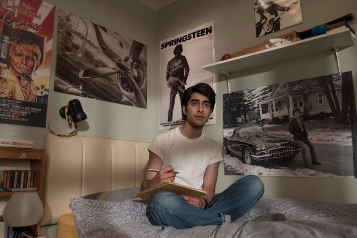 Javed, played by Viveik Kalra, writes poetry in his room while inspired by Bruce Springsteen.&nbsp;