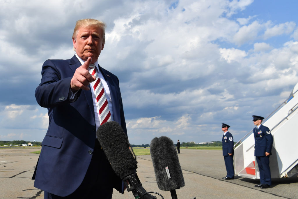 Trump gives a statement about the mass shootings in El Paso and Dayton before boarding his plane to Washington at Morristown Airport.