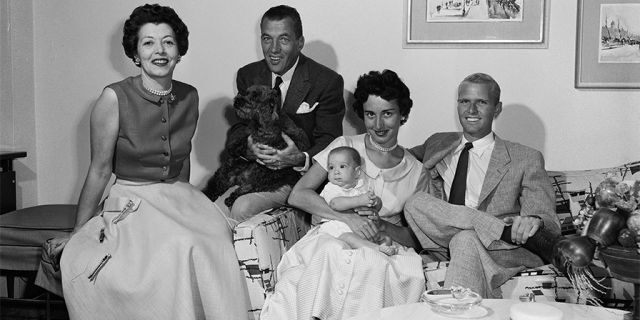 Ed Sullivan (second left) and his family, (left to right) wife Sylvia, grandson and future defense attorney Robert E. Precht, daughter Betty, and son-in-law naval officer and later television producer Robert Precht Jr., on July 20, 1954. (Photo by CBS Photo Archive/Getty Images)