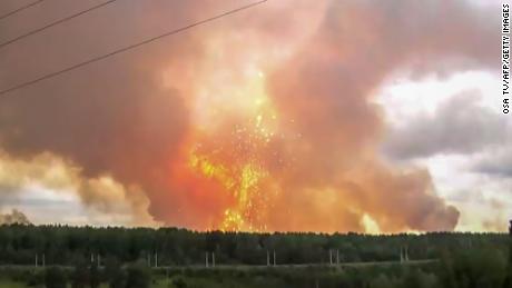 Explosions and evacuations after fire at military warehouse in Siberia