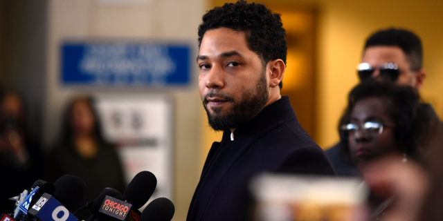 Actor Jussie Smollett talks to the media before leaving Cook County Court after his charges were dropped, Tuesday, March 26, 2019, in Chicago. (AP Photo/Paul Beaty)