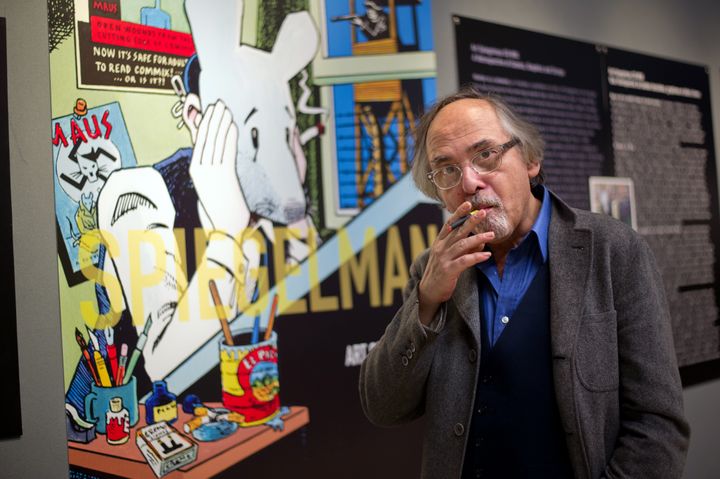 "Maus" creator Art Spiegelman poses next to his artwork in Paris in 2012.