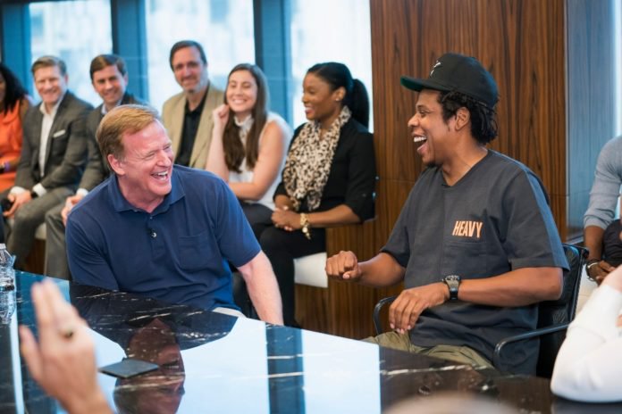 NFL Commissioner Roger Goodell, left, and Jay-Z appear at a news conference at ROC Nation on Wednesday, Aug. 14, 2019 in New York. The NFL and ROC Nation, Jay-Z’s entertainment and sports representation company, announced Tuesday they were teaming up for events and social activism, a deal Jay-Z said had been in the works over the last seven months. (Ben Hider/AP Images for NFL) thegrio.com