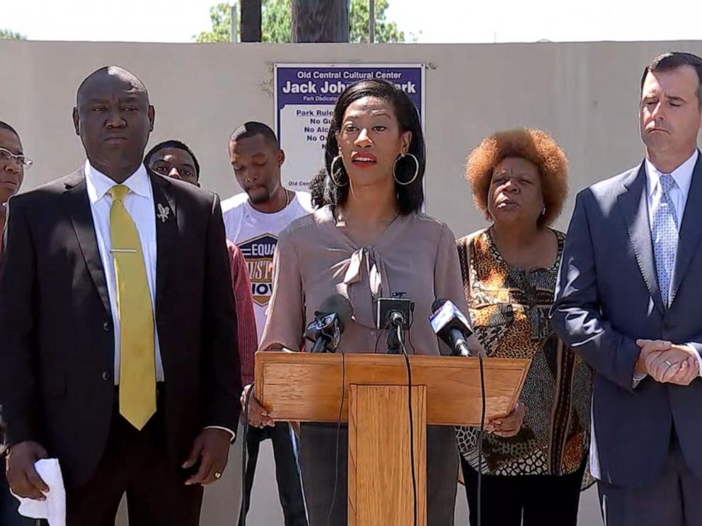 PHOTO: Donald Neelys civil attorney Benjamin Crump is seen second from left and his defense attorney Melissa Morris speaks at the podium. Both are calling for video from Neelys arrest to be released.
