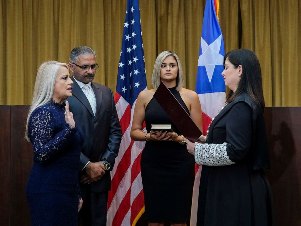 PHOTO: Justice Secretary Wanda Vazquez is sworn in as governor of Puerto Rico by Supreme Court Justice Maite Oronoz, in San Juan, Puerto Rico, Wednesday, Aug. 7, 2019.