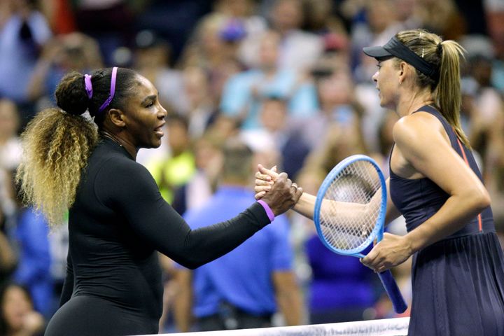 Maria Sharapova of Russia shakes hands after losing against Serena Williams at the 2019 U.S. Open in New York on Aug. 26, 201