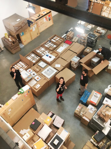 Boxes of archives being packed at Andrea Rosen Gallery before being sent to the Smithsonian.