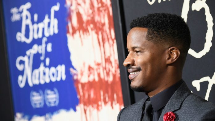 Director/Producer/writer Nate Parker attends the Premiere Of Fox Searchlight Pictures' 'The Birth Of A Nation' at ArcLight Cinemas Cinerama Dome on September 21, 2016 in Hollywood, California. (Photo by Frazer Harrison/Getty Images)