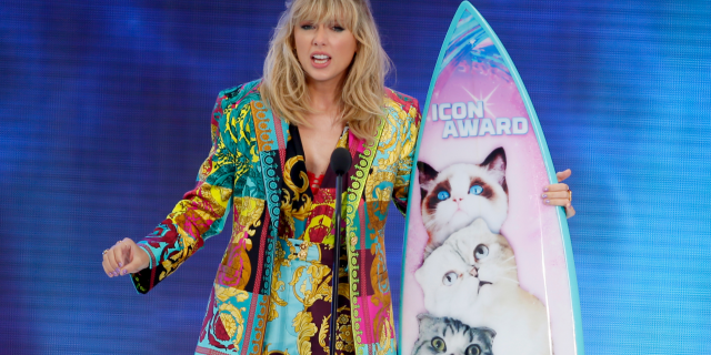 Taylor Swift accepts the Icon award at the Teen Choice Awards in Hermosa Beach, Calif. Swift plans to re-record her songs after her catalog was purchased by popular music manager Scooter Braun. (Photo by Danny Moloshok/Invision/AP, File)