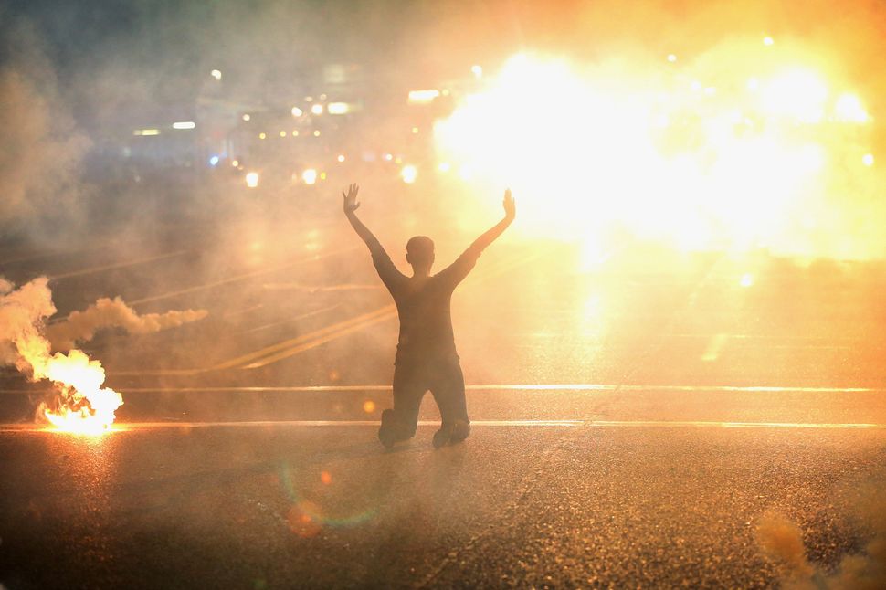 Protesters in Ferguson experienced high levels of violence at the hands of police officers including tear gas.
